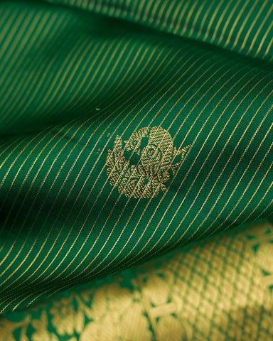 The green Kanjivaram silk saree - PattuCheeralu