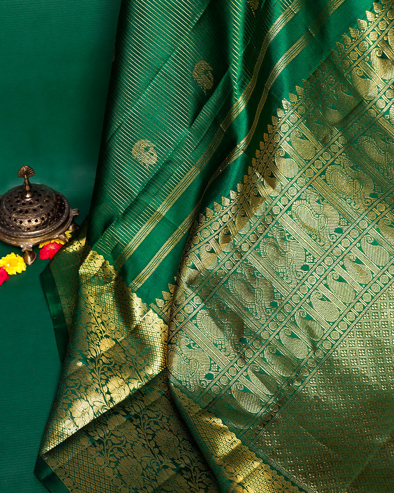 The green Kanjivaram silk saree - PattuCheeralu
