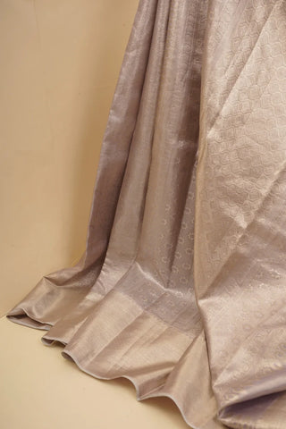Ivory tissue kanjivaram silk saree - PattuCheeralu